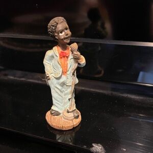 Light Blue and Orange Ceramic Figurine